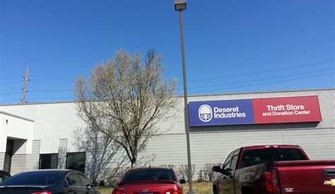 Salt Lake City, Utah - A blind man looks for shoes at the Deseret