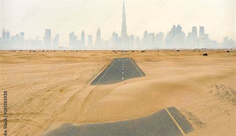 Deserted Roads In Dubai Aerial View Of Half Desert Road Or Street With Sand Dune