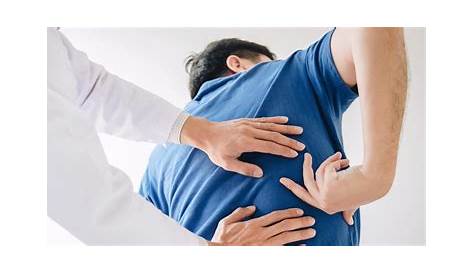 ¿Qué causa dolor en la parte baja de la espalda, hinchazón y gases?