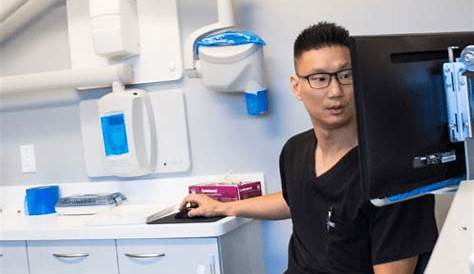 Dr Chung in Treatment Room w patient 150ppi-1100689 - Brand Awakening