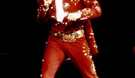 ELVIS ON STAGE IN THE RED PINWHEEL JUMPSUIT SOMETIME IN 1972 | Elvis