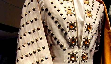 Elvis wearing the White Pyramid jumpsuit and cape. This jumpsuit was