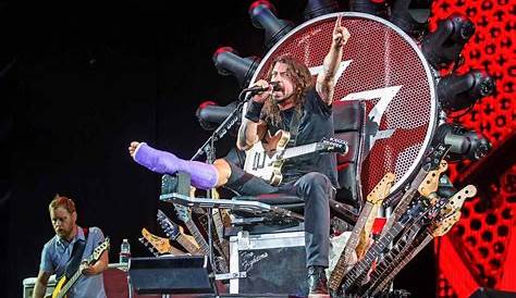 Dave Grohl plays shows with a broken leg beiber cancels because of a