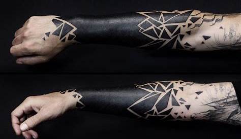 Large blackwork style forearm tattoo of strange ornament - Tattooimages.biz