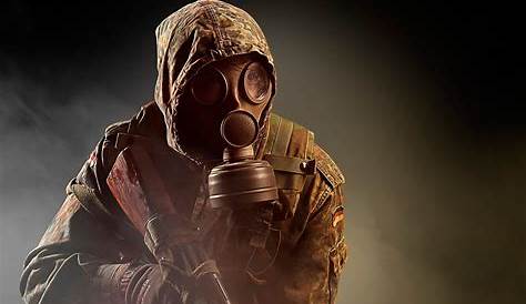 Man with gas mask and gun stock photo. Image of helmet - 27276992