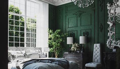 a bedroom decorated in black and white with green velvet furniture