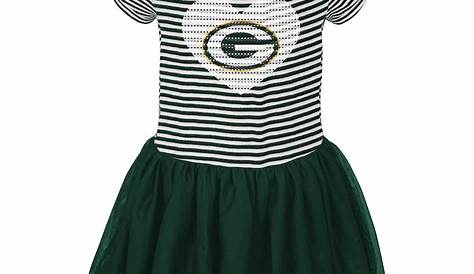 a woman in green bay packers shirt and skirt