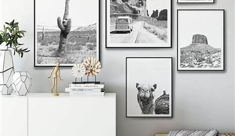 Fotowand met zwart-wit posters in zwart houten fotolijsten | Woonkamer