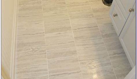 We installed ceramic tile in the bathroom and fixed the subfloor. We