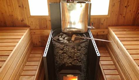The inside of the sauna has a new replacement wood burning stove