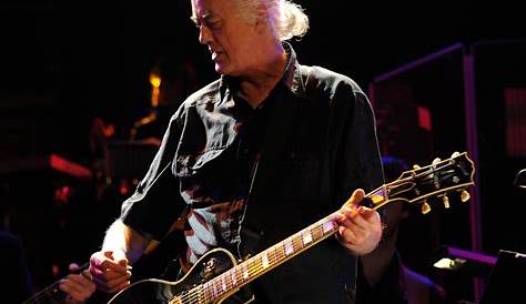 Led Zeppelin's Jimmy Page laughs, plays air guitar in court - CBS News