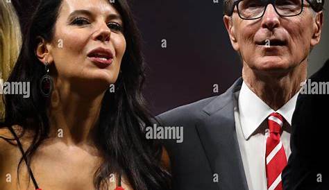 Liverpool owner John W. Henry and wife Linda Pizzuti Henry celebrate