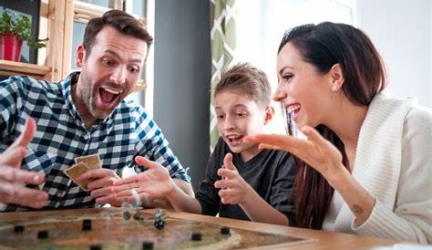 Family Playing Game Together At Home - Dr. Shefali