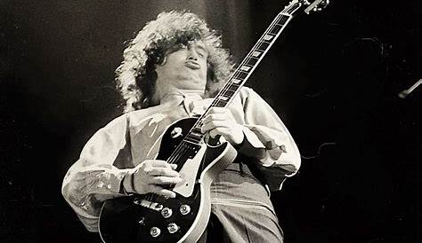 Led Zeppelin's Jimmy Page laughs, plays air guitar in court - CBS News