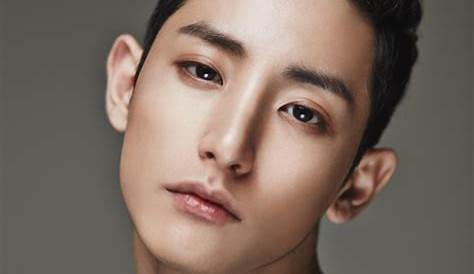 Lee Soo Hyuk is classy in black and white for "Elle" magazine