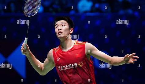 Denmark's Anders Antonsen walks out to play China's Li Shi Feng during