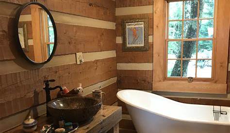 OMG! Lovely bathroom in log cabin home. Wonder if Nick can make me this