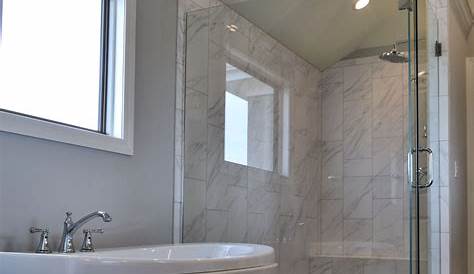 This master bath remodel features a beautiful corner tub inside a walk
