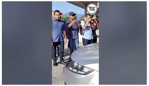 Mohd Nazri Abdul Razak leaves court grounds after being charged for