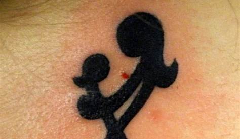 mother and child tattoo symbol | Mother with child tattoo.... similar