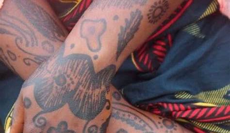 Unveil The Enchanting World Of Nigerian Tattoos: Discover Symbolism, Designs, And Cultural Significance
