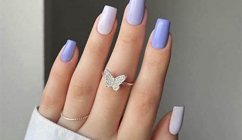 Oceanic Charm: Ink Blue Attire With Lavender Nails For A Serene Look