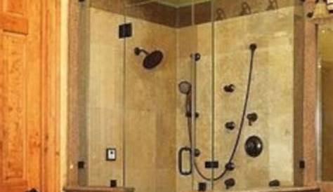 Stand up shower with rain head, body sprays, bench seat, shower wand