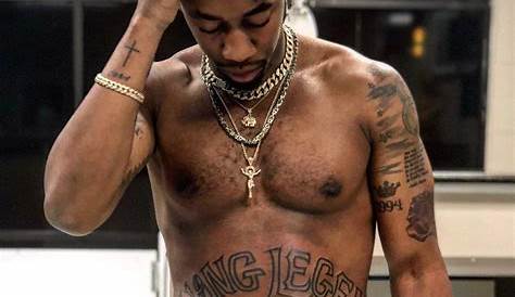 Canadian-Nigerian Rapper, Dax, Tattoos Nigerian Flag on His Neck (Photo