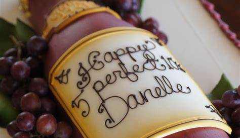 Red wine bottle shaped birthday cake with grapes | Gateau anniversaire