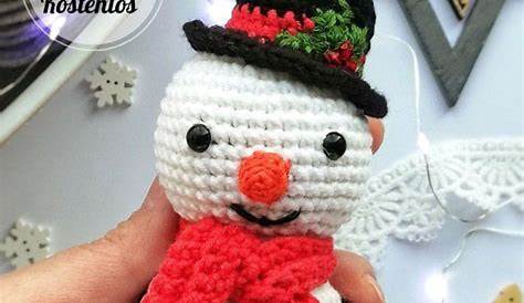 crocheted snowman and penguin dolls with pine cones