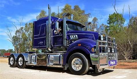 Modern Dark Blue Semi Truck Reefer Trailer Profile On Road Stock Photo