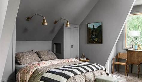 Kat Alves Photography modern cabin Sloped ceiling bedroom