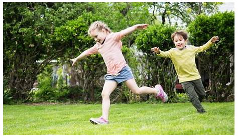 "Spielende Kinder im Garten" Stock photo and royalty-free images on