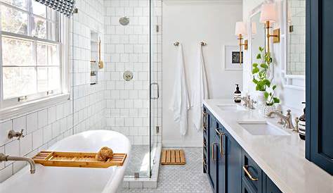 a large bathroom with two sinks and a bathtub