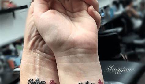 Stepmom and stepdaughter matching tattoos in support of my Asperger’s