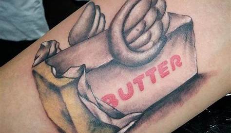 Micro-realistic butter tattoo on inner arm