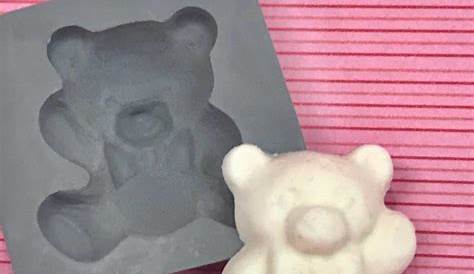 Teddy Bear holding a Tree Chocolate Mold // Photo via web