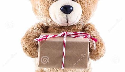 Teddy Bear Holding Gift Box on Wood Stock Image - Image of friendship