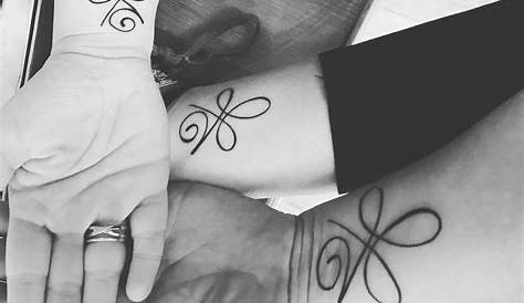Unveil The Meaning And Inspiration Behind Unconditional Love Family Symbol Tattoos
