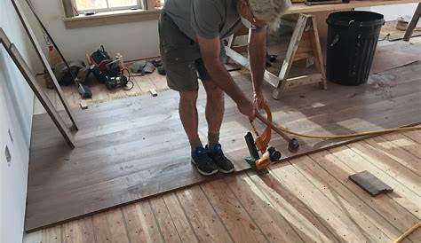 Installing unfinished hardwood to later sand and finish! Floor