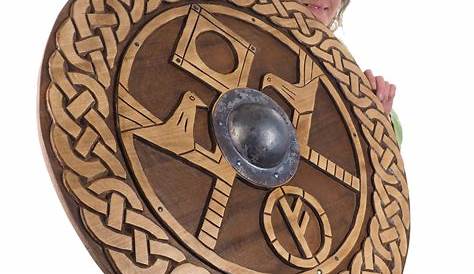 Image - 13402164-Old-viking-wooden-shield-isolated-on-white-Stock-Photo