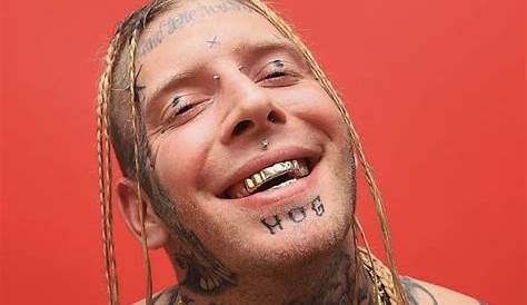White Rapper With Dreads And Face Tattoos - Musicians With Face Tattoos