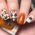 Artistic Leaves: Channel Your Creativity with Leaf-adorned Fall Nail Designs