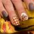 Autumn Chic: Trendy Nail Designs Featuring Beautiful Leaves