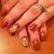 Autumn Elegance at Your Fingertips: Lovely Scarecrow Nail Designs