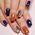 Autumn Vibes: Stylish Nail Designs Featuring Trendy Leaf Accents