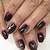 Captivating Charm: Radiate Your Inner Beauty with Dark Plum Nails