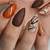Captivating Fall Shades: Adorn Your Nails with Beautiful Burnt Orange Nail Designs