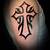 Cross And Tribal Tattoos