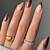 Decadent Fascination: Alluring Chocolate Brown Nail Art Styles